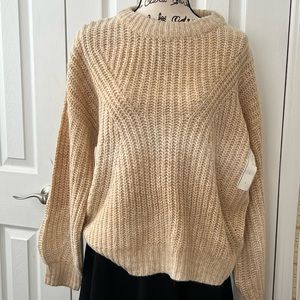 Woman’s crew neck sweater